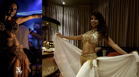 Buikdanseres met de muziek van een Arabisch DJ